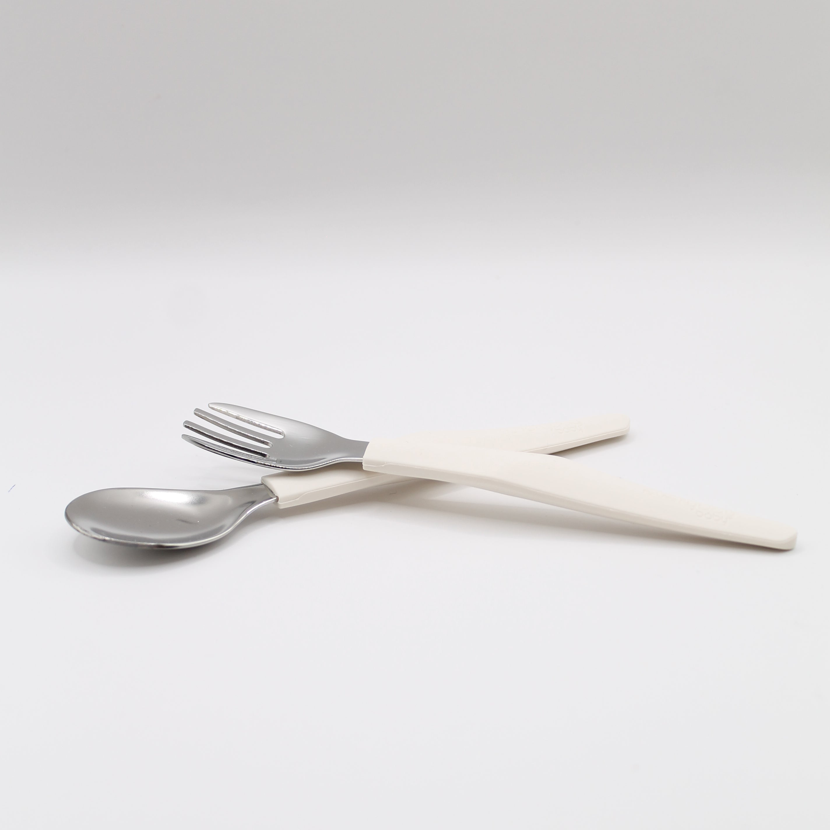 Barnbestick i rostfritt och silikon